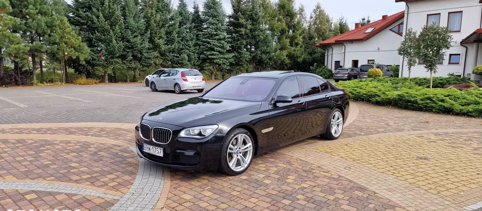 samochody osobowe BMW Seria 7 cena 119999 przebieg: 120000, rok produkcji 2014 z Wołczyn